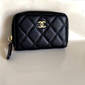 Black quilted mini wallet with gold logo